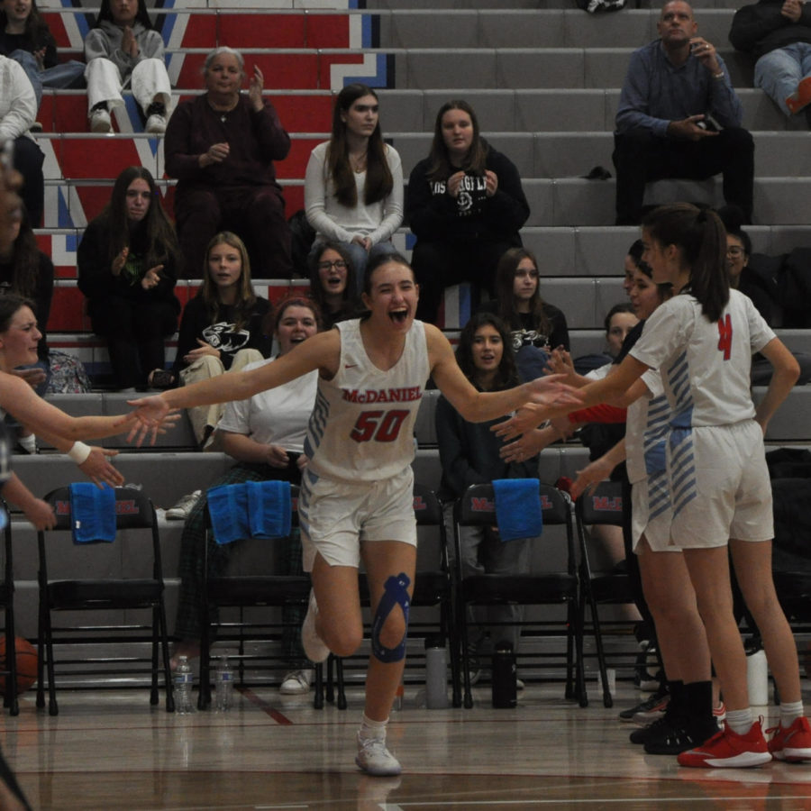 Junior+Madison+Schaefer+runs+out+at+the+start+of+the+McDaniel+v.+Glencoe+girls+varsity+basketball+game+on+Nov.+30.+This+was+the+inaugural+game+of+the+season+and+ended+24-50+in+favor+of+Glencoe.