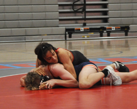 Sophomore wrestler Ahmeil Keys goes for a pin. Cale Holt listed him as a wrestler to keep an eye on this season.