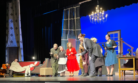 Wadsworth the Butler, played by senior Ellery Endicott, delivers a plot twist to the main characters and audience. The play was based the 1985 film, Clue.