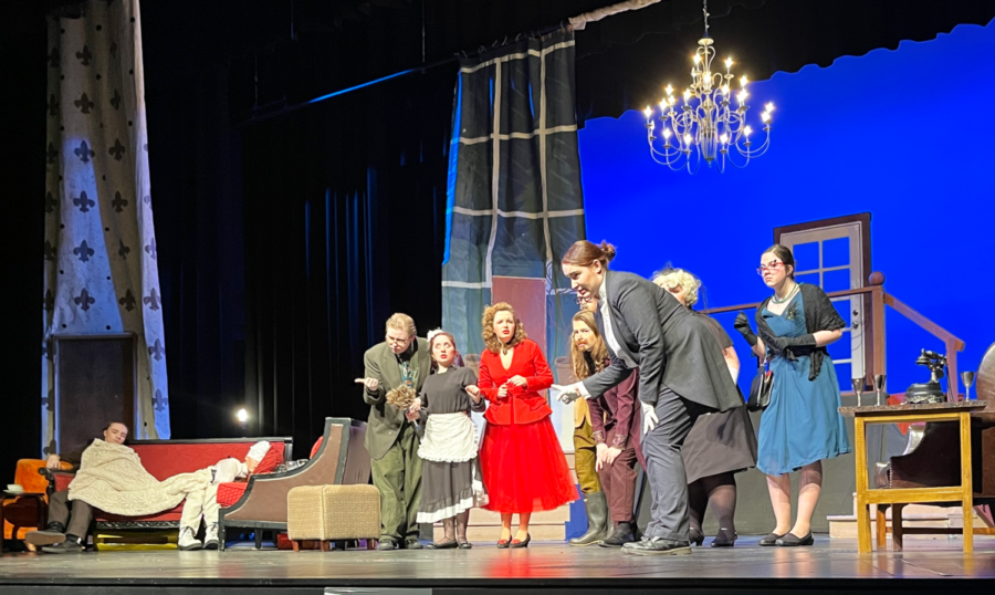 Wadsworth the Butler, played by senior Ellery Endicott, delivers a plot twist to the main characters and audience. The play was based the 1985 film, Clue.
