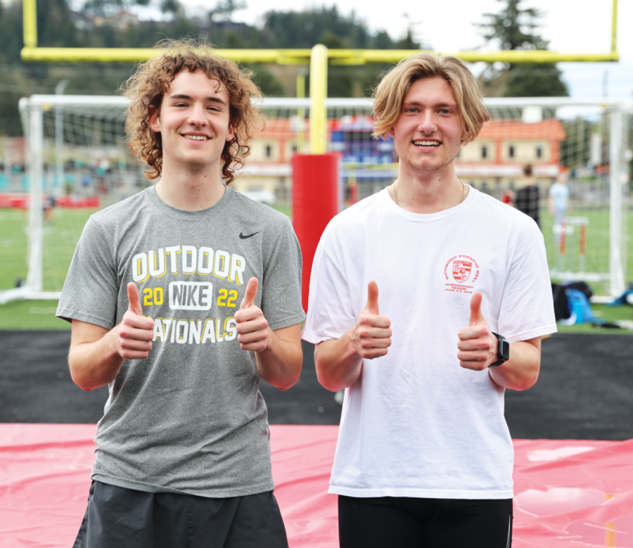 Seniors Finn Quinn (left) and Raphael Blandini (right) smile after track practice. After a long recruiting process, they’ve committed to run in college.