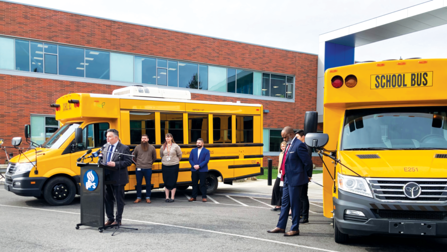 Superintendent Guadalupe Guerrero making remarks at the press conference where the buses were unveiled. The purchase of the buses is among the first steps the district has taken to meet the commitments listed in its CCRP.
