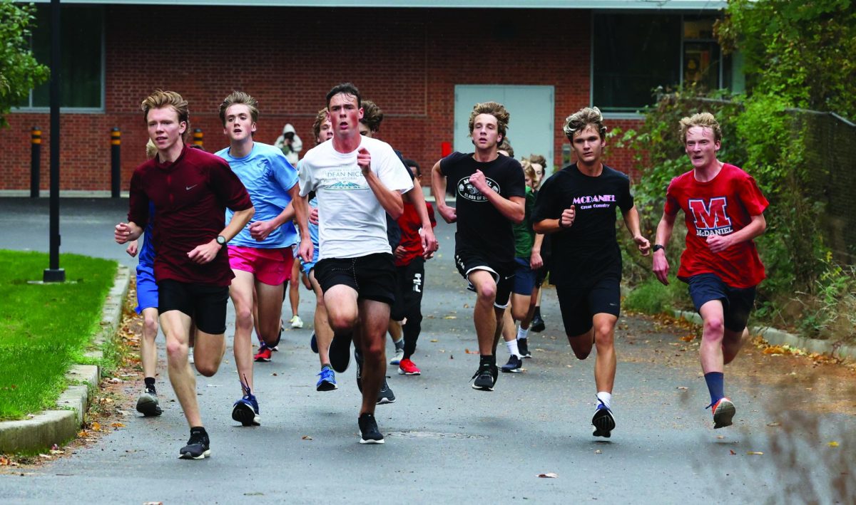 The cross country team practices on the roads outside the school. They hope to improve on their PRs from last season.