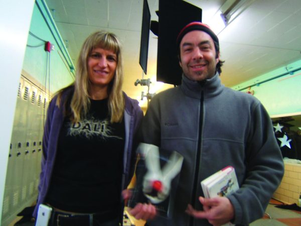 Gene Brunak posing for a photo with the director of Twilight, Catherine Hardwicke, while the filming happens.