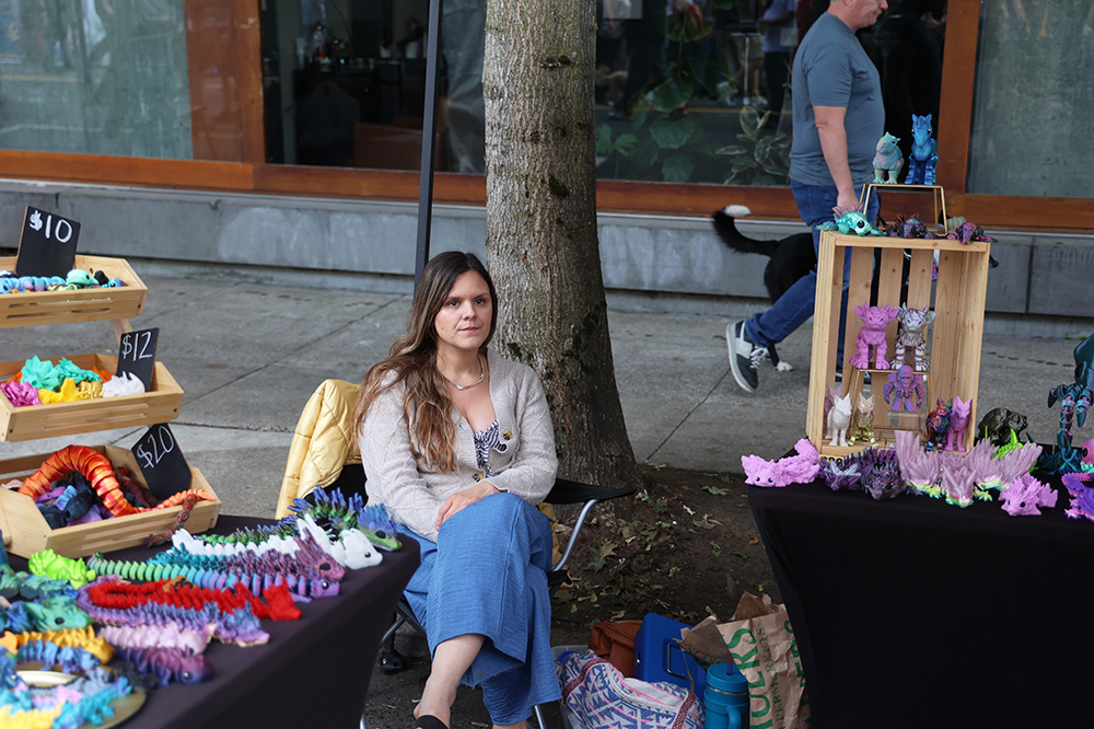 Enchanted 3D Printing, owned by Maria Mueske, stands close to the center of the fair. She sells a multitude of 3D printed creatures such as wolves, bats and owls, as well as her most popular items which include dragons, dinosaurs and fidgets. Mueske stated how she appreciates seeing the children's positive reactions to her work. 