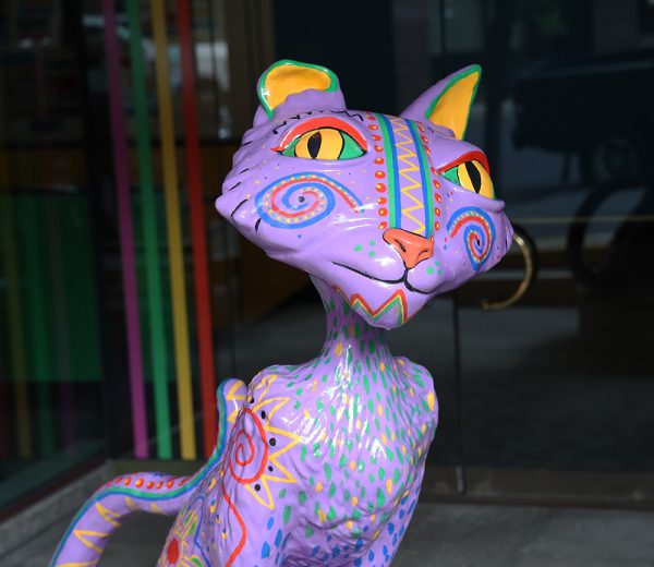 Isabella Figueroa created the statue named “Alebrije” that has made the journey from the Arlene Schnizer Concert Hall to The Judy Kafoury Center for Youth Arts where it currently sits. A light purple background color, blue and red swirls, yellow spikes and a cluster of blue, yellow and green spots on its chest can all be seen adorning its coat. The design was inspired by Mexican culture and creativity.