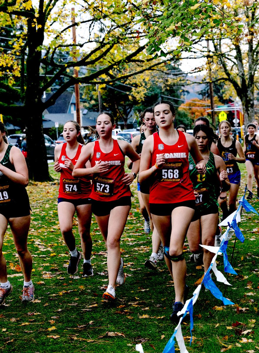 Twins Sophia and Charlotte U'Ren (Left) and Matilda Nicholson (Right) run ahead of Cleveland and Jefferson.