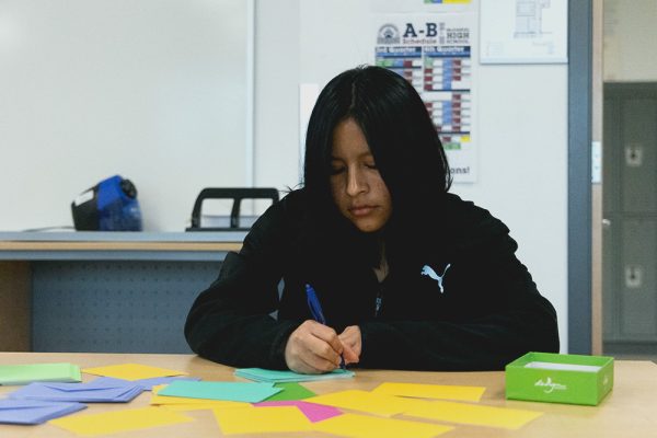 Junior Lily Gutierrez Morales writes notes to send to all the newcomers who have made it through the first semester. Newcomer representative Morale's goal is to welcome all the newcomer students into McDaniel.