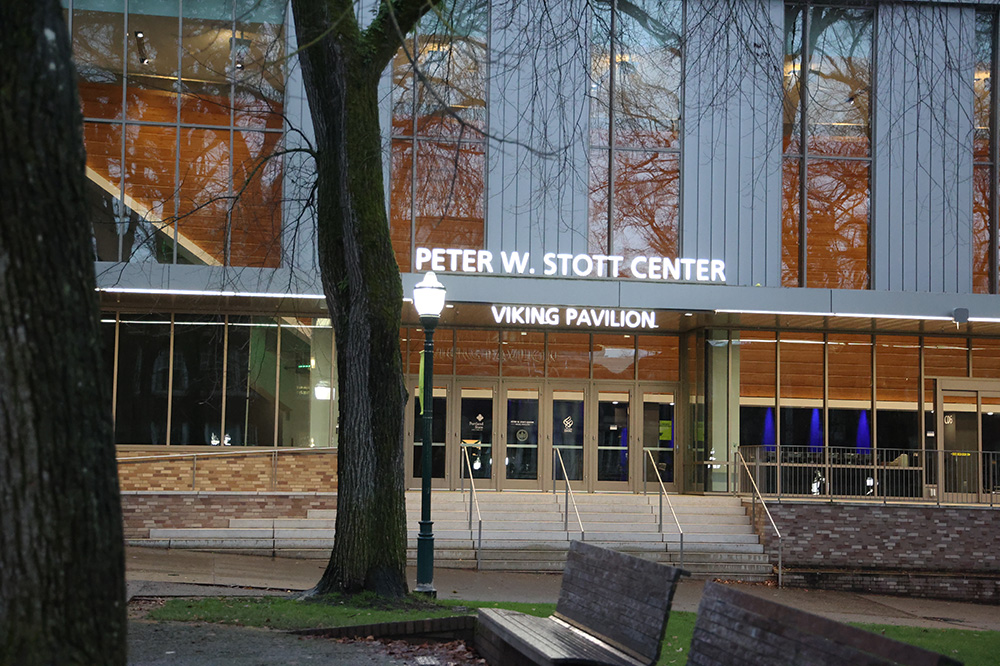 The entrance of the Viking Pavilion at PSU. As the sun sets, the bold lights
atop the the entrance way brighten the building.