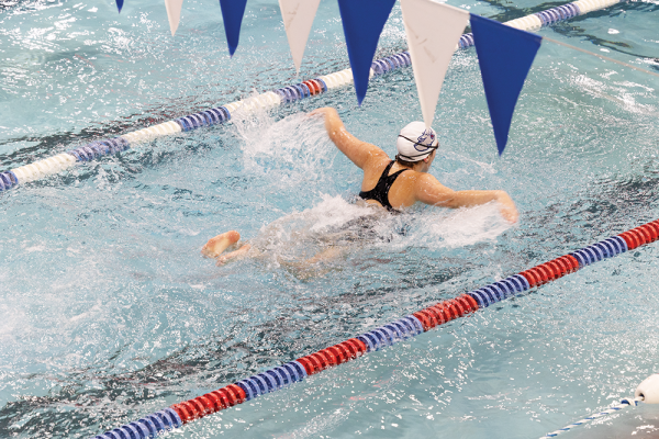 Freshman Leone Cook competes in the 50 butterfly and freestyle relay. Cook hopes to improve on gaining speed and the technical aspects of swim. 