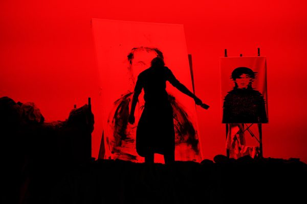 Junior Stellan Malmstrom stands tall as Macbeth. The play opened with Malmstrom painting erratically and dramatically in character.