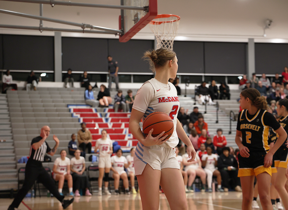 Junior post Izzy Hale retrieves the ball after it is called out of bounds and gets ready to go back on offense. The Mountain Lions for a strong defensive line throughout the game.