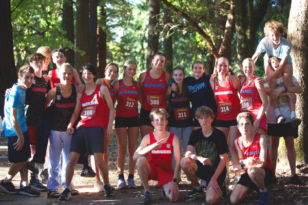 Cross country team posing for a group photo at Pier Park. The community is excited to see the team continue to expand.