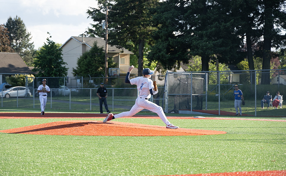 Senior captain and pitcher James Rouna-Banister throws a fastball against the Jefferson Democrats on May 18th. Rouna-Banister had a great day, pitching the full game for senior night, and the game ended 10-0.